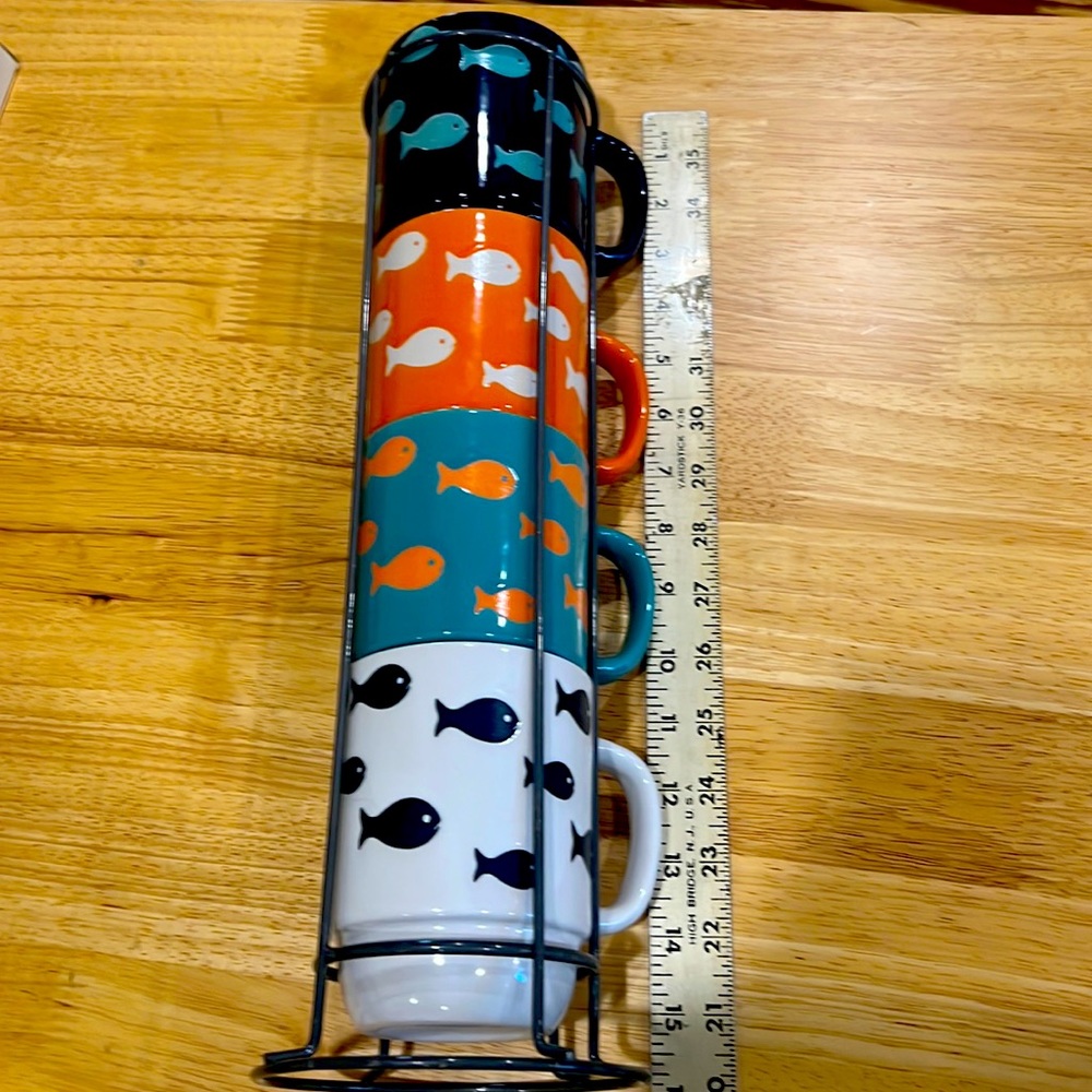 Mug stack by Boston Warehouse in colorful, graphic “goldfish” pattern.